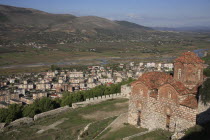 Albania, Berat, St Triada Church on the right with Berat new town beside the River Osum in the background.