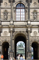 GERMANY, Saxony, Dresden, The central Courtyard and Picture Gallery of the restored Baroque Zwinger Palace gardens busy with tourists originally built between 1710 and 1732 after a design by Matthus...