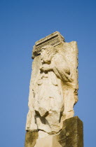 Turkey, Izmir Province, Selcuk, Ephesus, Ruined masonry and relief carving in antique city of Ephesus on the Aegean sea coast.