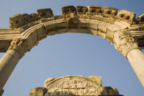 Turkey, Izmir Province, Selcuk, Ephesus, Detail of carved archway, supporting columns and wall frieze in ancient ruined city of Ephesus on the Aegean sea coast.