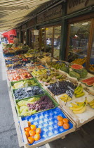 Austria, Vienna, The Naschmarkt, Display of fresh fruit for sale outside shopfront.  