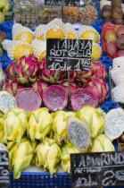 Austria, Vienna, The Naschmarkt, Display of fruit for sale including exotic Dragon Fruit, genus Hylocereus, also known as sweet pitayas.