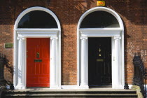 Ireland, County Dublin, Dublin City, Red and black Georgian doors in the city centre south of the Liffey River.