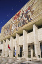 Albania, Tirane, Tirana, National History Museum, Mosaic on the exterior facade of the National History Museum in Skanderbeg Square with steps to entrance below.