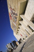 Albania, Tirane, Tirana, National History Museum, Angled view of exterior facade and entrance to the National History Museum in Skanderbeg Square with mosaic representing the development of Albanias h...