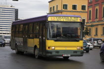 Albania, Tirane, Tirana. Public bus amongst other traffic.