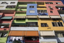 Albania, Tirane, Tirana, Multi coloured apartment block.