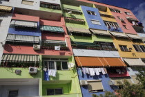 Albania, Tirane, Tirana, Multi coloured apartment block.