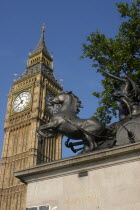 England, London, Westminster, Big Ben with the statue of Boudicea in the foreground.