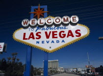 USA, Nevada, Las Vegas, Welcome to fabulous Las Vegas sign with the Mandalay hotel behind on Las Vegas Boulevard south.