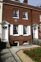 England, Hampshire, Portsmouth, The Charles Dickens Birthplace Museum in Old Commercial Road where he was born in 1812 and lived for three years commemorated with a blue plaque.