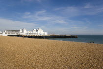 ENGLAND, Hampshire, Portsmouth, South Parade Pier built in 1908 on the seafront in Southsea with the pebble shingle beach.