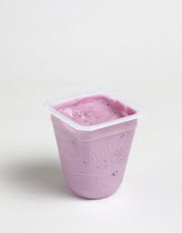 Food, Organic, Yogurt, Yeo Valley probiotic blueberry fruit yogurt pot against a white background.