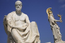 Austria, Vienna, Statues of the Greek historian, Polybius, and Athena on the right, in front of Parliament.