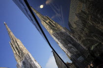 Austria, Vienna, Stephansdom Cathedral and its reflection in a shop window.