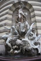 Austria, Vienna, Michaelertrakt, the southern gateway into the Hofburg Palace. The statues and figures include Heracles, the greatest of the Greek heroes, and represent Austrias power over land and s...