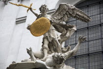 Austria, Vienna, Sculpted figures above the entrance to St Michaels Church.