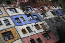 Austria, Vienna, Hundertwasser-Krawinahaus colourful exterior.