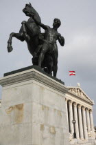 Austria, Vienna, Bronze statue of a horse tamer by Joseph Lax in front of Parliament building, Symbol of the suppression of passion.