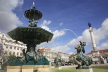 Portugal, Lisbon, Fountain and monument to Dom Pedro IV in Rossio Square.