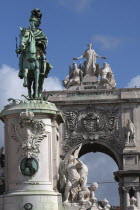 Portugal, Lisbon, Statue of King Jose 1 & the Triumph Arch in Praca do Comercio.