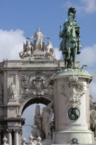 Portugal, Lisbon, Statue of King Jose 1 & the Triumph Arch in Praca do Comercio.