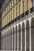 Portugal, Lisbon, The arches of the government buildings in Praca do Comercio.