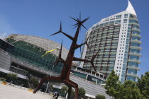 Portugal, Estremadura, Lisbon, Vasco da Gama shopping centre with the Homem Sol sculpture by Jorge Vieira inthe Park of Nations.