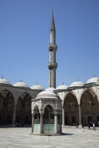 Turkey, Istanbul, Sultanahmet Camii, Blue Mosque, courtyard with minaret.