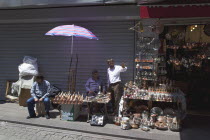 Turkey, Istanbul, Eminonu, Misir Carsisi, Spice Market, metal goods vendors at the entrance.