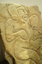 Mexico, Oaxaca, Monte Alban, Detail of relief carving  depicting a dancer.