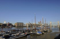 England, London, Tower Bridge on the River Thames with the Shard skyscraper behind.