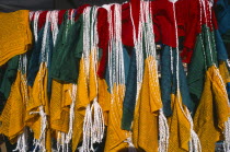 China, Tibet, Lhasa, Barkhor red green and yellow prayer flags.