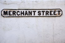 England, West Sussex, Bognor Regis, Old cast iron road sign for Merchant Street.