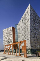 Ireland, Belfast, Titanic Quarter, Titanic Belfast Visitor Experience, General angular view of the building with Titanic sign outside.