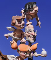 Spain, Valencia Province, Valencia, Papier Mache figures in the street during Las Fallas festival.