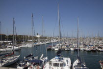 Spain, Catalonia, Barcelona, Yachts moored in Port Olimpic marina.