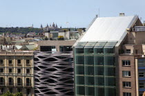 Spain, Catalonia, Barcelona, Eixample, view over modern office buildings toward Montjuic.