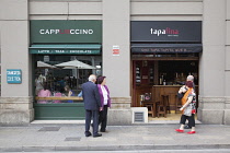 Spain, Catalonia, Barcelona, Tapas Bar and coffee shop in the narrow streets of the Gothic Quarter.