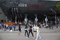 Spain, Catalonia, Barcelona, Mare Magnum mirrored glass modern shopping mall.