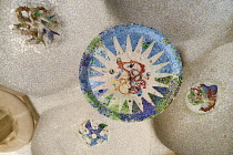 Spain, Catalunya, Barcelona, Parc Guell by Antoni Gaudi, ceiling Mosaic in the Hypostyle Room.