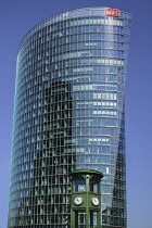 Germany, Berlin, Potzdamer Platz, Bahn Tower fronted by a replica of the square's clock.