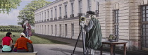 Germany, Berlin, Charlottenburg Palace, Tourists chat in front of an information hoarding relating to restoration of sections of the palace,