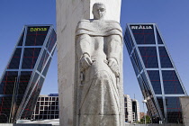 Spain, Madrid, Puerta de Europa with the monument to Calvo Sotelo in the foreground at Plaza de Castilla.