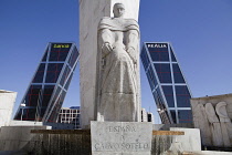 Spain, Madrid, Puerta de Europa with the monument to Calvo Sotelo in the foreground at Plaza de Castilla.