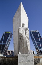 Spain, Madrid, Puerta de Europa with the monument to Calvo Sotelo in the foreground at Plaza de Castilla.