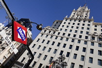 Spain, Madrid, Metro Sign outside Edificio Telefonica on Gran Via.