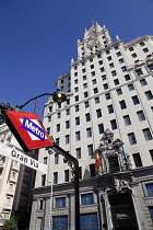 Spain, Madrid, Metro Sign outside Edificio Telefonica on Gran Via.