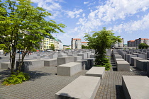 Germany, Berlin, Mitte, Holocaust Memorial designed by US architect Peter Eisenmann with a field of grey slabs symbolizing the millions of Jews killed by the Nazis.