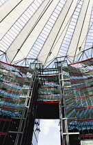 Germany, Berlin, Mitte, Potsdamer Platz, The Sony Centre designed by architect Helmut Jahn with the canopy over the central Forum of restaurants, offices, cinemas, shops and apartments.